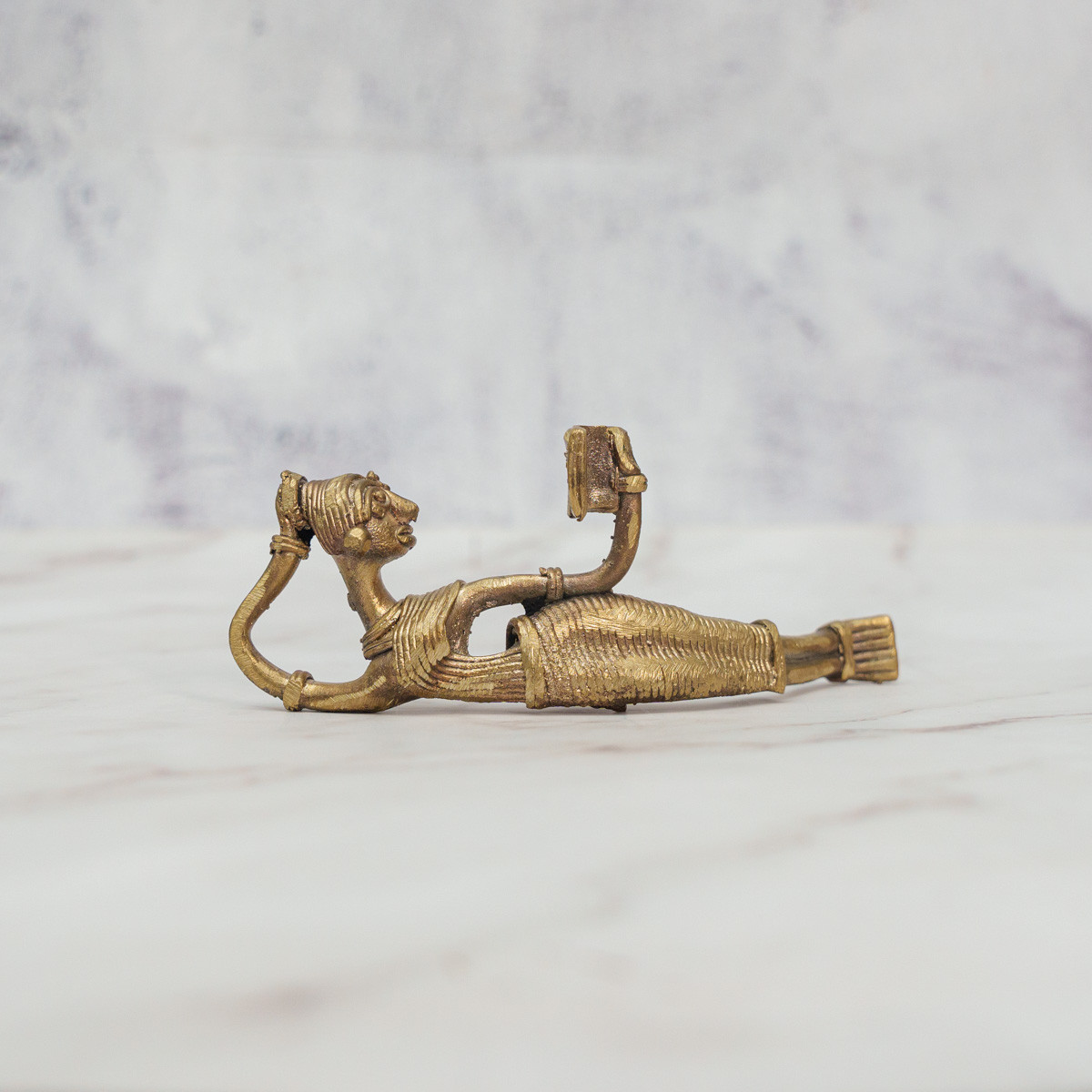 Dokra Reading Figure